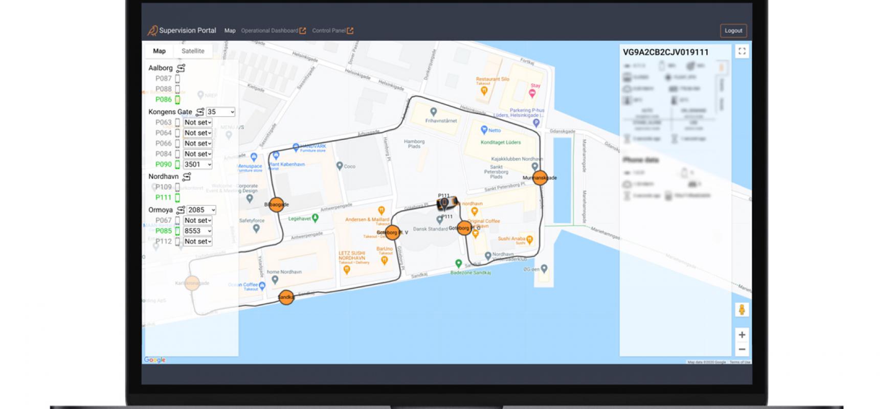 Illustration of a laptop with a map showing a route for autonomous vehicles in a city.