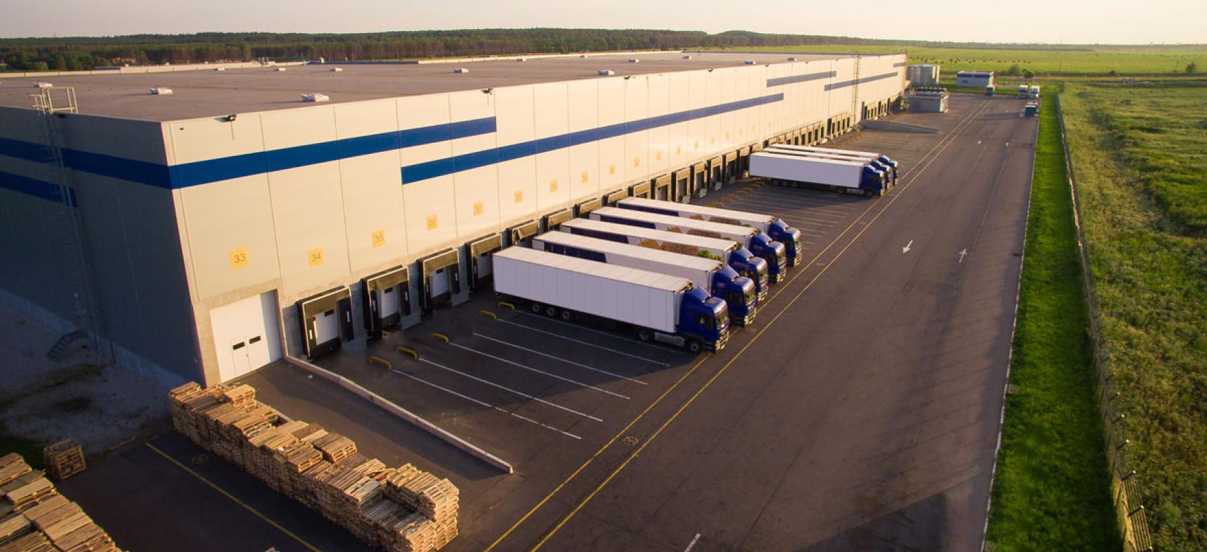 Logistics center with trucks