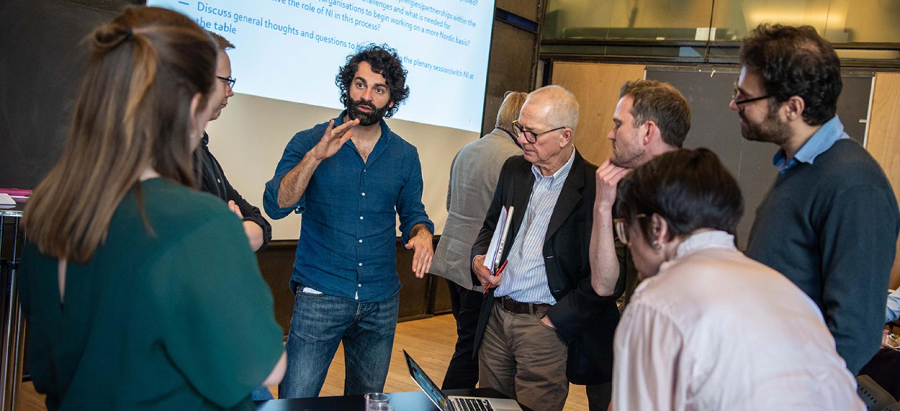 Participants from different projects discussing ideas and possible collaborations at the kick-off meeting for the projects at DogA in Oslo.