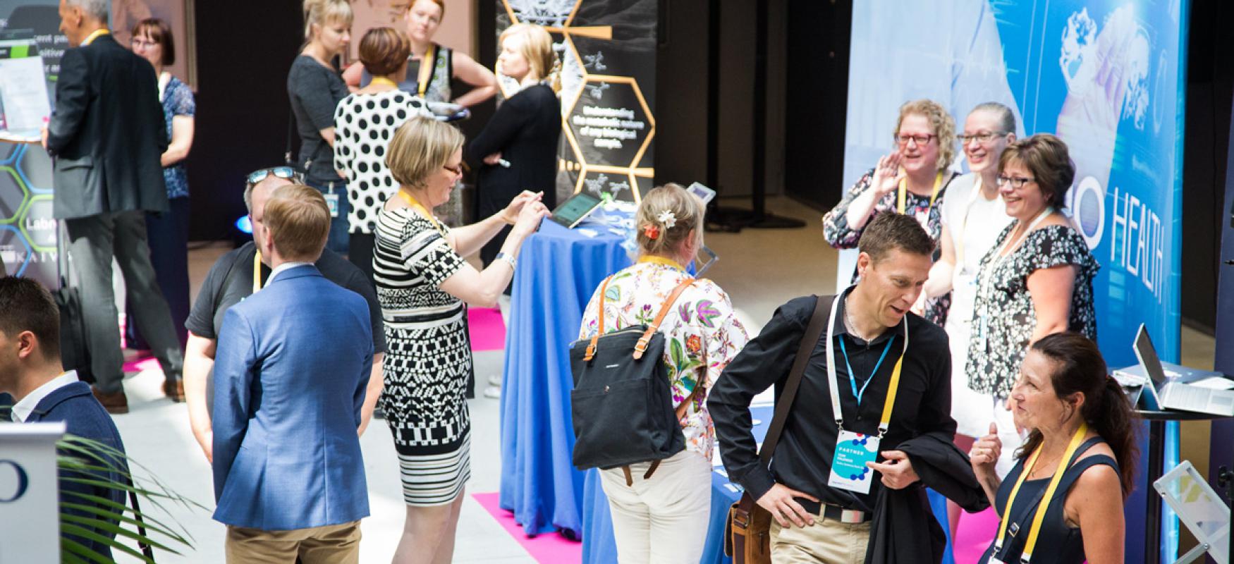 People and stands at the Upgraded Life Festival 2018 in Helsinki.