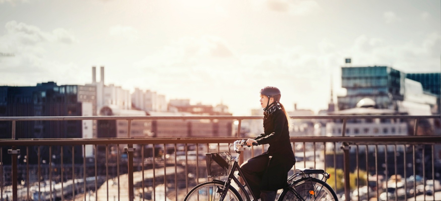 Woman on bicycle in Stockholm.